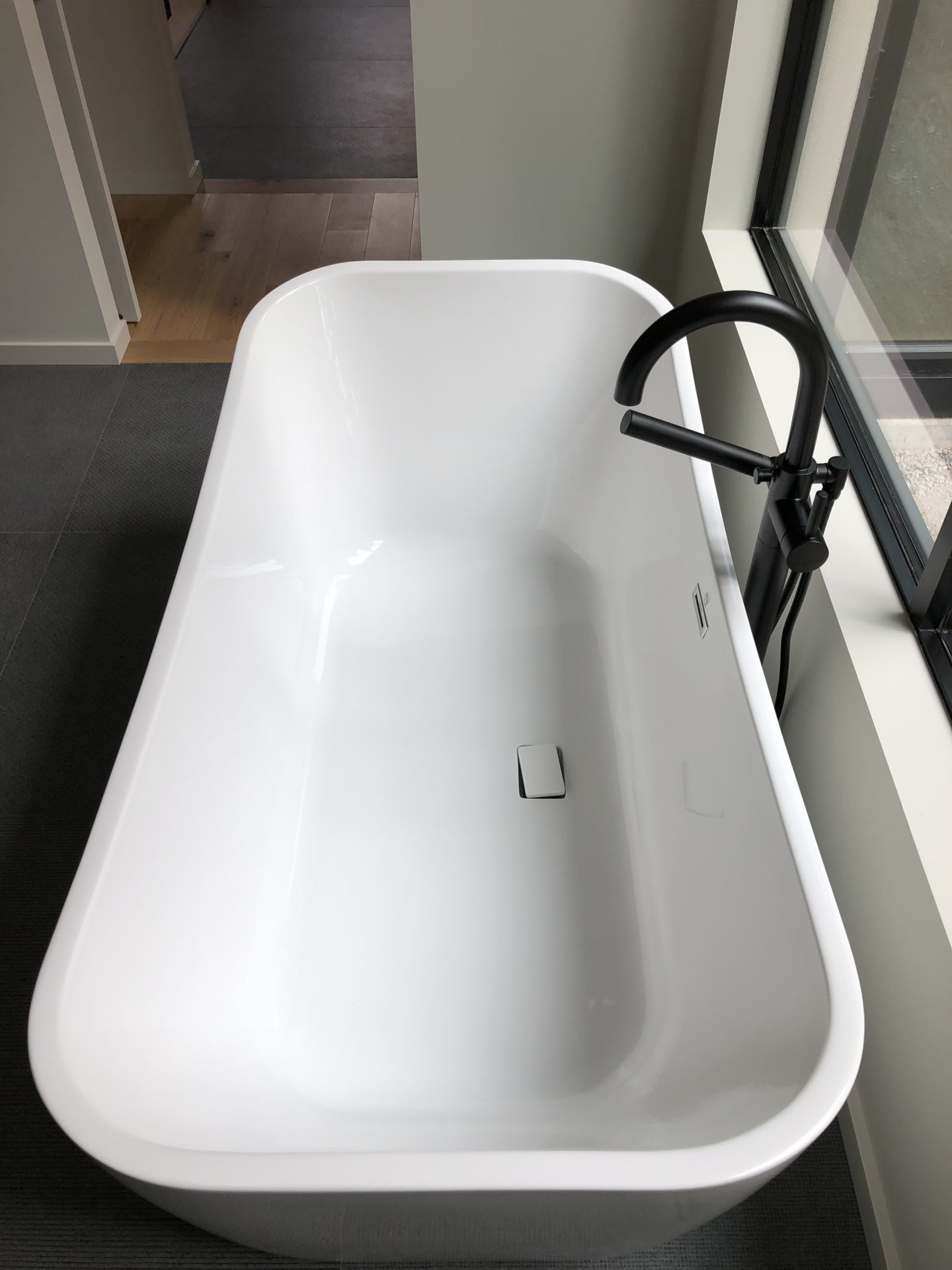 Modern bathroom with herringbone tile