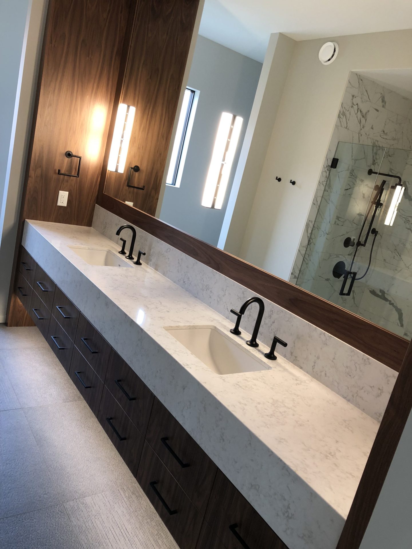 Luxury bathroom shower with marble tile