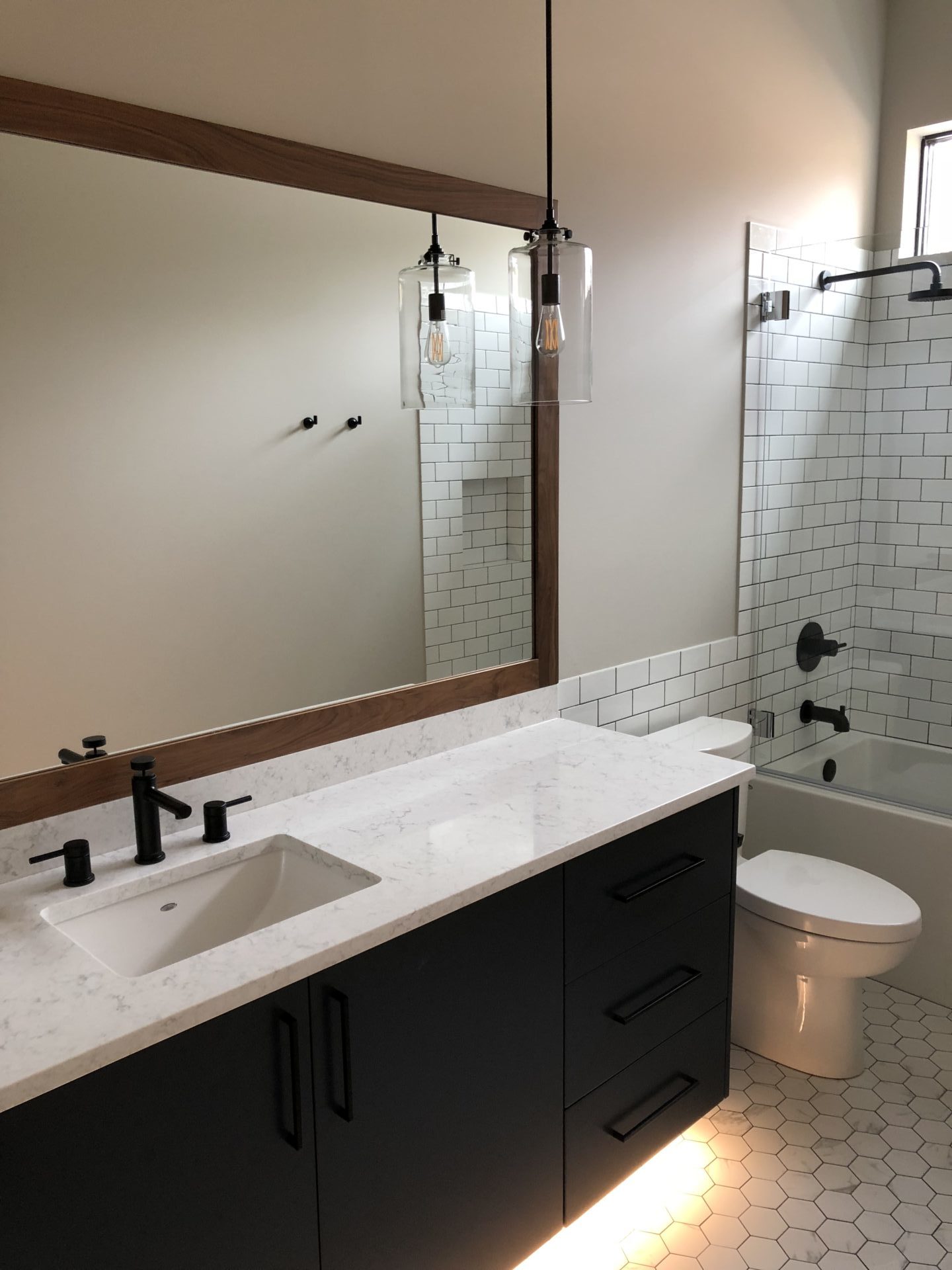 Bathroom with vessel sink and granite countertop